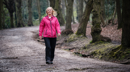 A lady with diabetes moving more and doing some walking exercise in the park