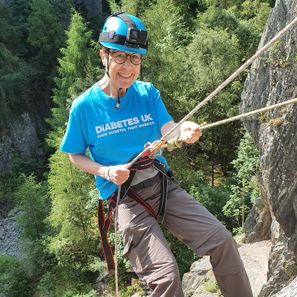 Christine abseiling