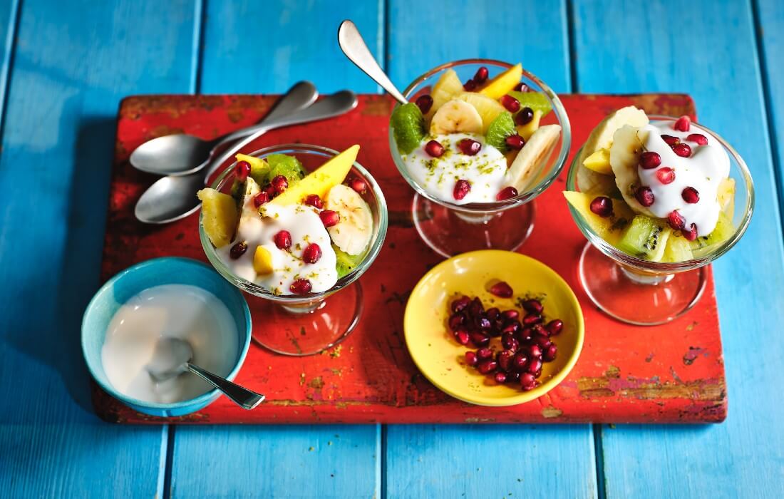 Warm spiced tropical fruits with coconut yogurt