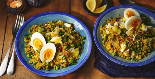 Cauliflower Kedgeree in blue bowl on table