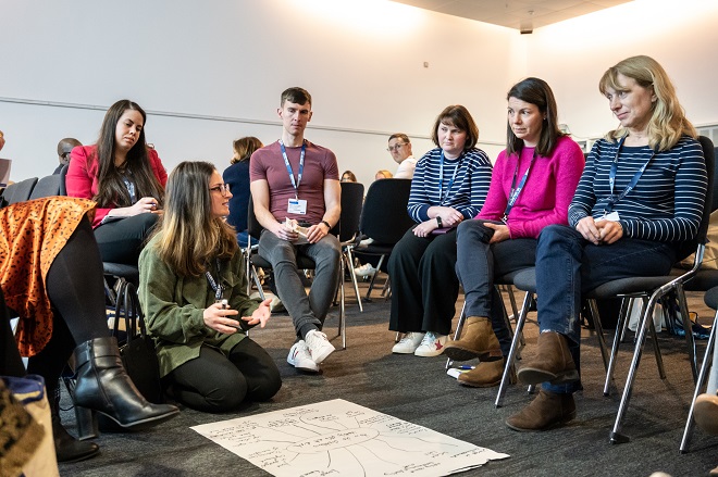 Professionals having an interactive group discussion