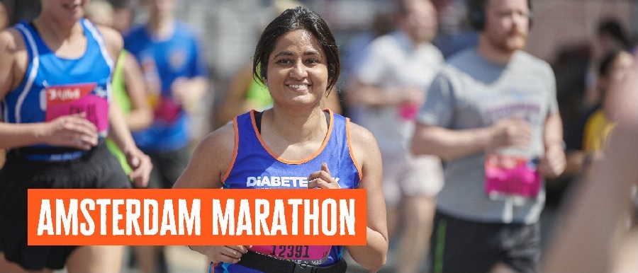 Female Runner with Diabetes UK vest smiling at the camera.