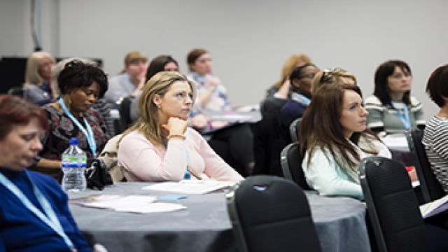 People sitting in a conference room