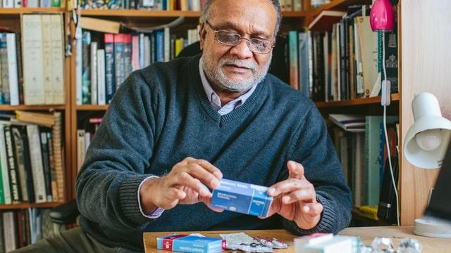 A man living with diabetes taking treatment for his condition