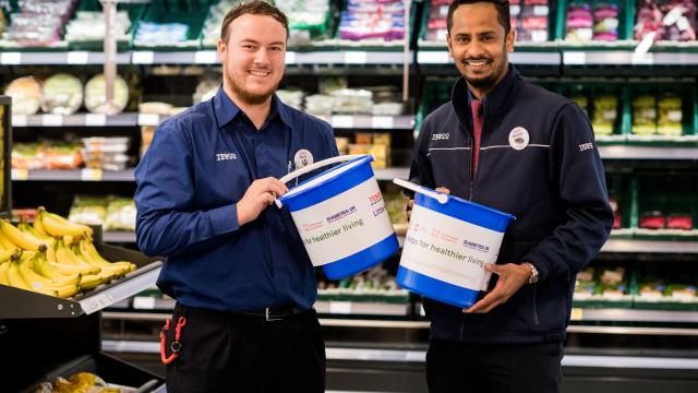 Tesco employees doing a bucket collection