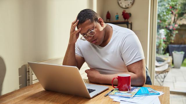 Worried man at laptop