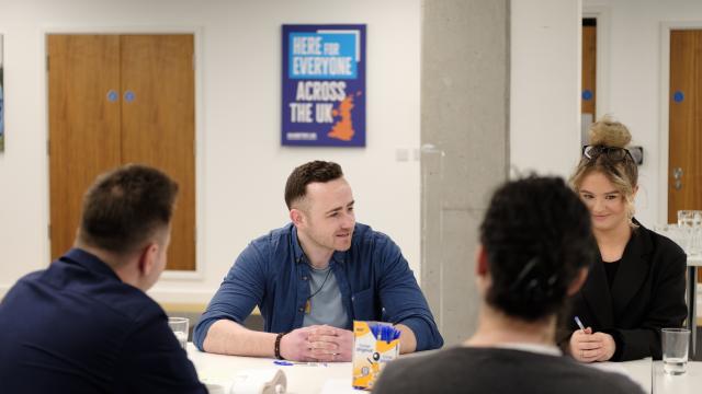 people sitting in a meeting