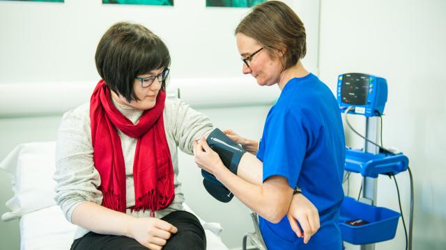 nurse taking blood pressure