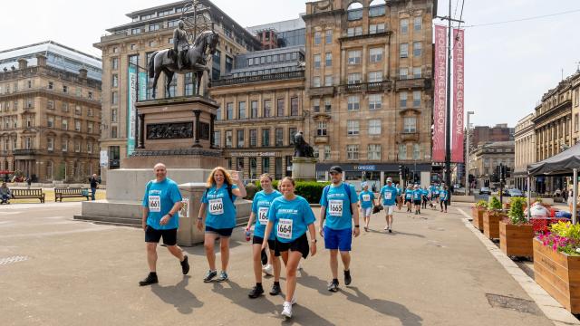 Diabetes UK Glasgow Wellness Walk fundraisers walking through George Square