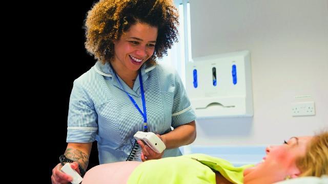 A woman having a pregnancy scan