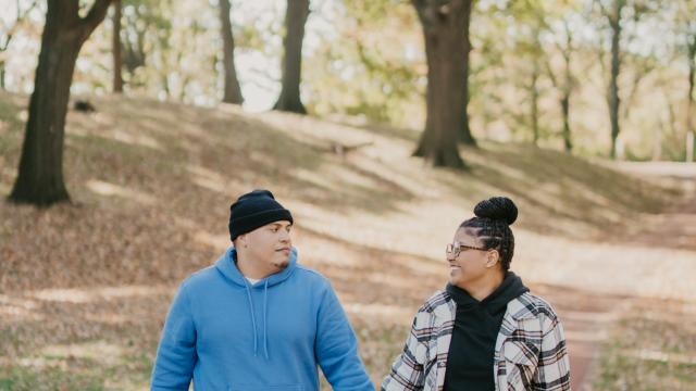 Couple walking in park