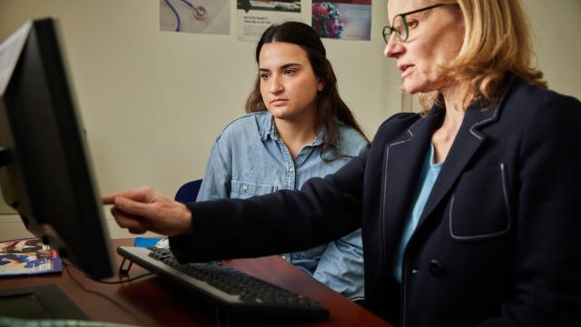 woman talking to doctor