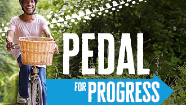 Pedal for Progress text over image of lady on bicycle with basket