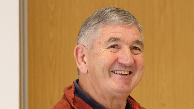 Photo of volunteer Peter Jackson, man wearing red jumper. 