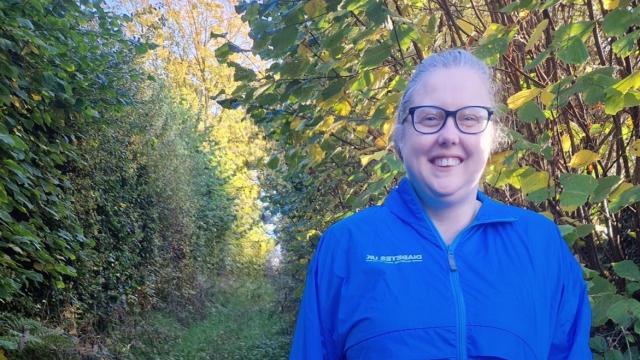 Photo of Roberta Hill, Volunteer Spotlight December 2024. Woman wearing blue jacket. 