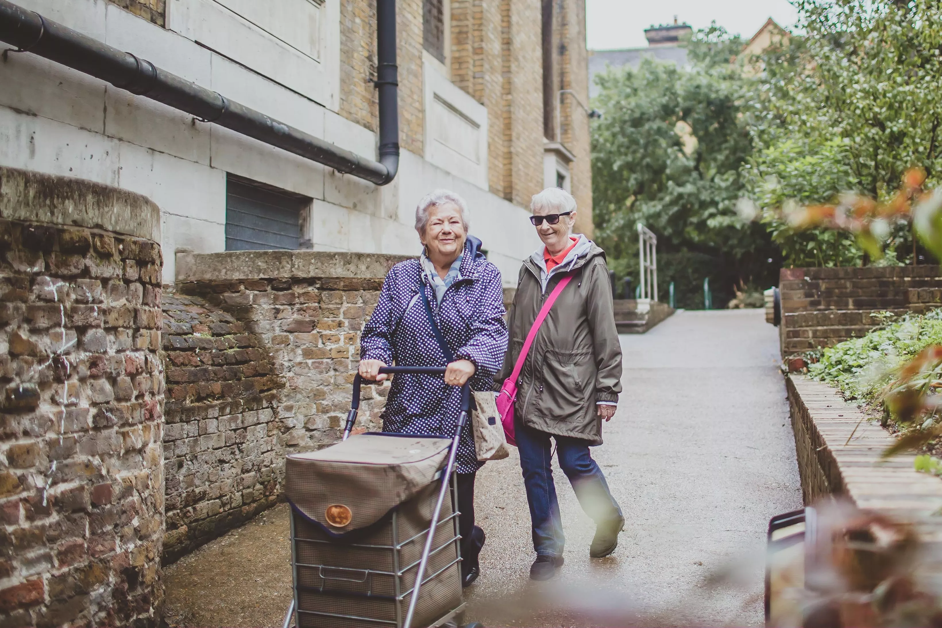 Two older ladies walking together