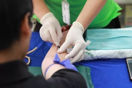 A lady giving blood