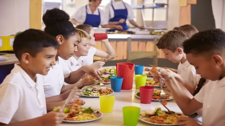 school children eat meal