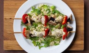 Marinated chicken skewers with couscous