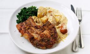 Pork chops with roasted pear, apple and new potatoes