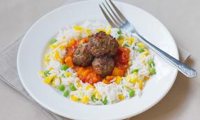 Sweet and sour meatballs with veggie rice