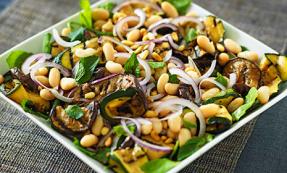 Minted aubergine with spinach and pine nuts 