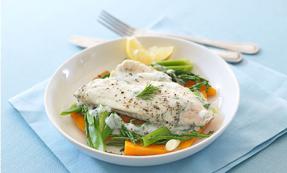 Poached plaice with spring onion and baby carrots 