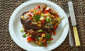 Aubergine stuffed with tofu, mushrooms and borlotti beans 