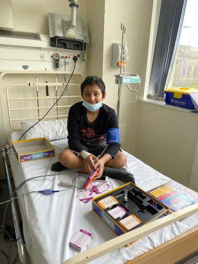 Mahn sitting on the bed during the immunotherapy trial