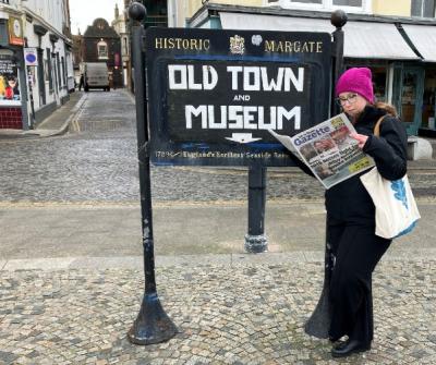 Margate old town with Charlotte reading a paper