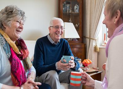 old people chatting in care home